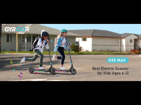 Two kids riding on GYROOR H30 Max e-scooters in an urban setting.